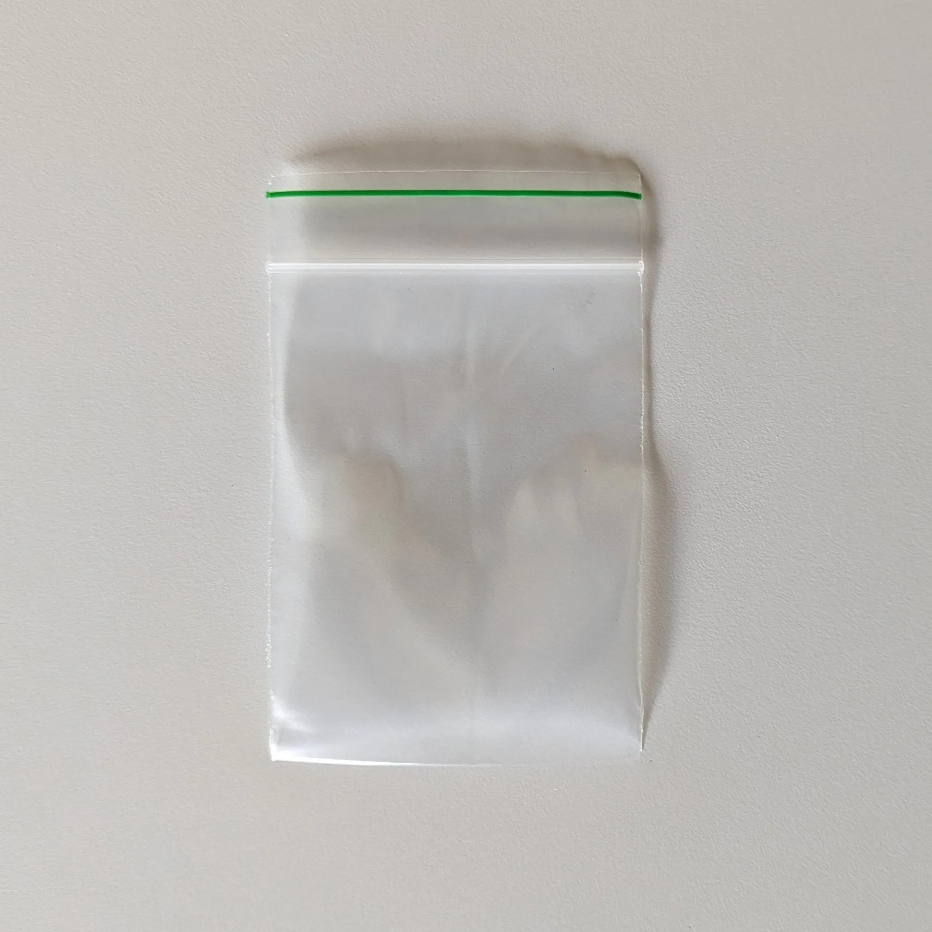 3" x 4" x 2 mil Small Clear Landfill-Biodegradable Plastic Ziplock Bags with Resealable Zipper, Green Line (Pack of 100)